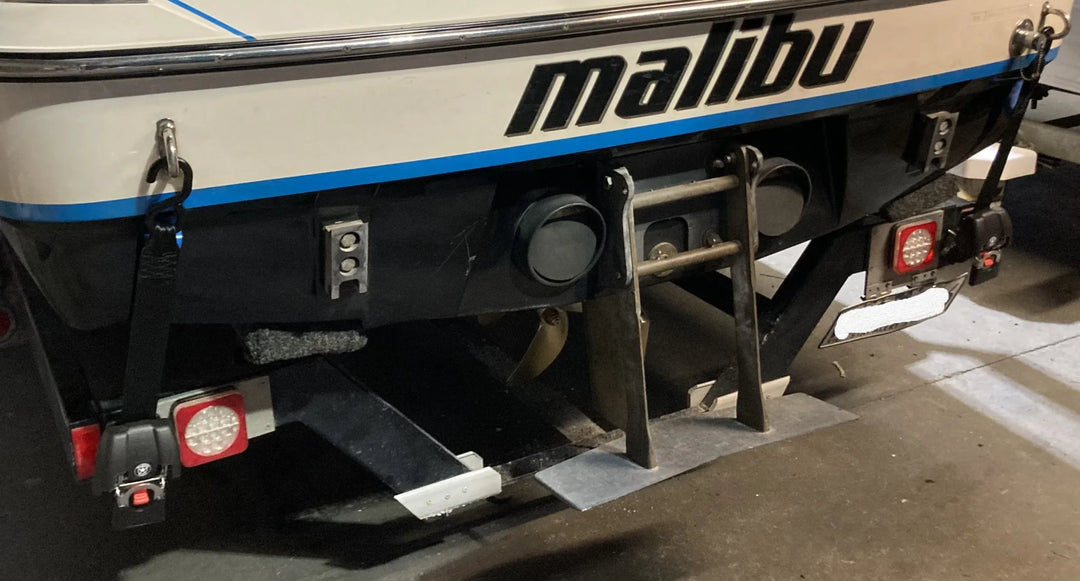 RETRACTABLE BOAT TRAILER TIE-DOWNS